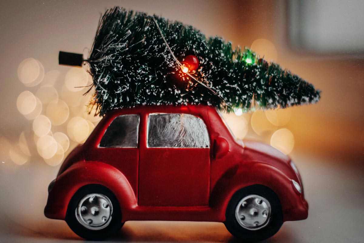 Red car with Christmas tree on top